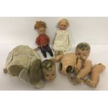 A collection of vintage dolls to include composition. All dolls in need of repair.