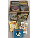 A collection of vintage children's books and annuals.