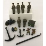 A small collection of pre war lead figures and play pieces to include Britains and Dinky.