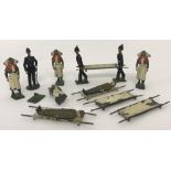 A collection of Britains pre war lead soldiers from set #137 Army Medical Services.