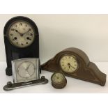 Four vintage clocks.