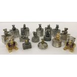 A small collection of metal teddy bear trinket boxes.