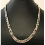 A decorative 925 silver multi flat link style necklace with large spring ring clasp.