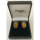 A pair of 925 silver amber set oval stud earrings for pierced ears.