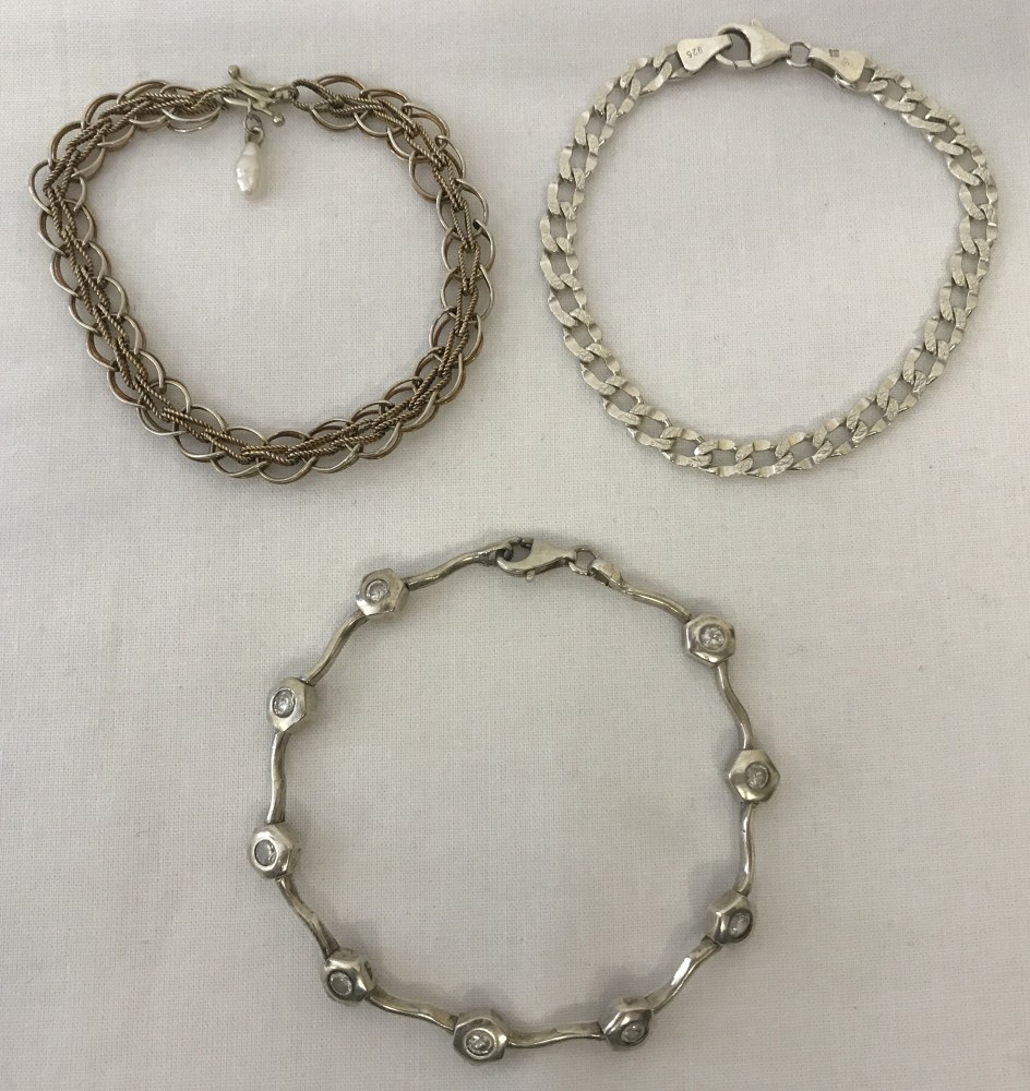 Three ladies silver bracelets.