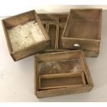 A collection of assorted vintage light wood boxes in various sizes.