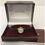 A boxed ladies Rotary wristwatch with thin brown leather strap.