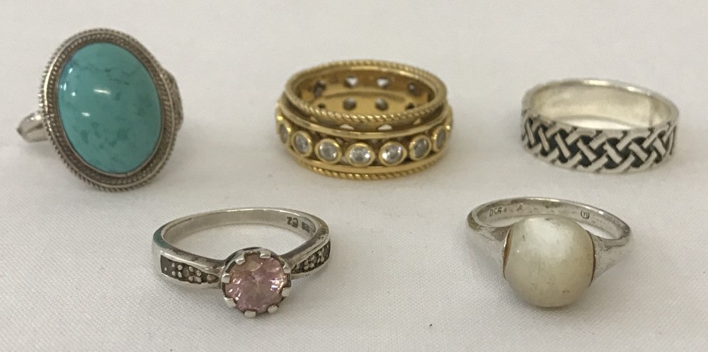 5 silver ladies dress rings.