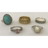 5 silver ladies dress rings.