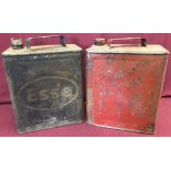 A vintage Esso 2 gallon petrol can together with a vintage red 2 gallon petrol can.