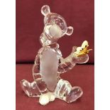 A Lennox Lead crystal figure of Disney's Tigger with a butterfly on his hand.