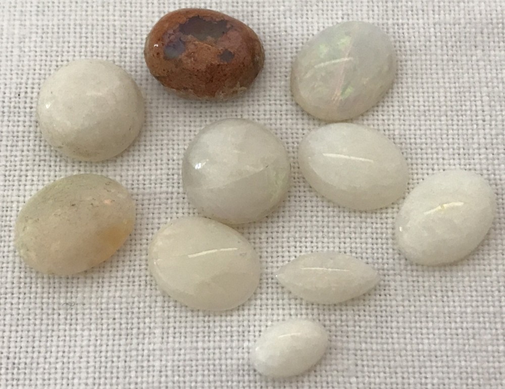 10 cut and polished opals for jewellery making.