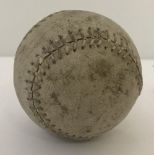 A vintage American white leather baseball.