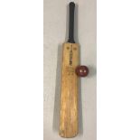 A Colin Milburn, England & Northampton cricket bat by Gray Nicolls. Marked Harrods.