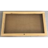 A large pine framed jewellery display case with clear Perspex top.