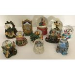 A collection of Disney character snow globes to include Tinkerbell, Winnie The Pooh and Aladdin.