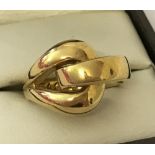 A 925 silver gilt knot design ring by Agatha.