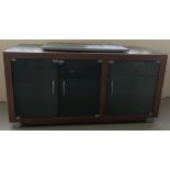 A modern gunmetal grey and red wooden TV and entertainment unit.