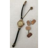 A Victorian gold stick pin together with a 9ct gold cased ladies wrist watch & 9ct gold cufflinks.