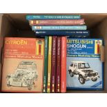 A box of 25 assorted vintage Haynes owners workshop manuals.