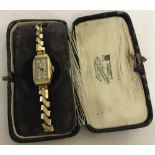 A ladies vintage wristwatch with rolled gold case.