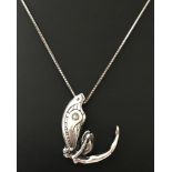 An Art Nouveau style silver fairy pendant on an 18 inch fine box chain.