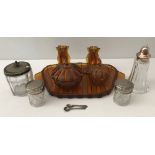 An Art Deco Amber glass dressing table set together with a small collection of assorted glass ware.