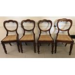 A set of 4 Victorian mahogany balloon back chairs with turned front legs and drop in seats.