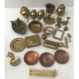 A small collection of brass and copper items.