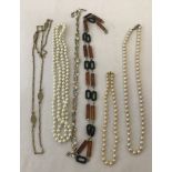 A collection of 6 vintage costume jewellery necklaces to include 4 with faux pearls.