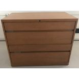 A modern heavy oak lateral 2 draw filing cabinet.