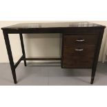 A vintage 2 drawer dark wood desk.