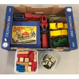 A box of mixed vintage toys.