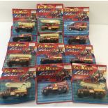 A box of 12 unopened blister packed 1990's diecast fire engines.