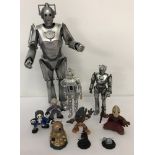 3 Cybermen play figures together with 5 Time Squad figures and 2 Dr. Who games pieces.