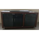 A modern gunmetal grey and red wooden TV and entertainment unit.