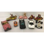A collection of Corgi, Ertl and Dinky TV and film character vehicles.