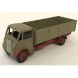 Dinky Supertoys Guy 4 ton lorry with fawn cab and truck and red chassis, wings 7 hubs.