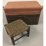 A plaited rush trunk with terracotta hessian lid and trim together with a small string topped stool.