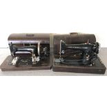 A cased vintage Singer electric sewing machine complete with key.