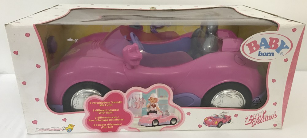 A brand new boxed Zapf Creations Baby Born interactive car. Ex shop stock.