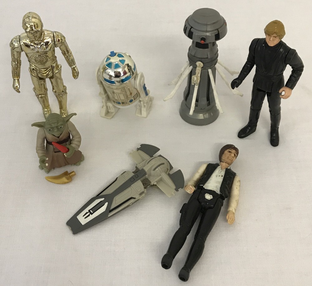 A small collection of Star Wars 70's, 80's and 90's figures and vehicle.