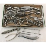 A collection of vintage dentistry tools and accessories.