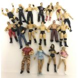 A collection of 17 Jakks Pacific 1999-2003 WWE wrestling jointed, poseable figures.