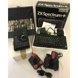 A vintage ZX Spectrum + Sinclair games console complete with original box.