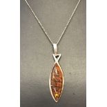 A 925 silver modern design pendant set with amber on an 18" fine curb chain.