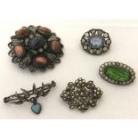 A collection of 5 silver and white metal vintage stone set brooches.