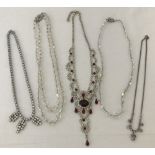 A small collection of vintage diamante and aurora borealis glass bead necklaces.