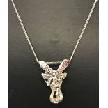 An Art Nouveau style 3D fairy pendant on a silver 18" fine curb chain.