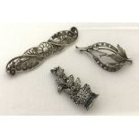 3 vintage silver brooches.
